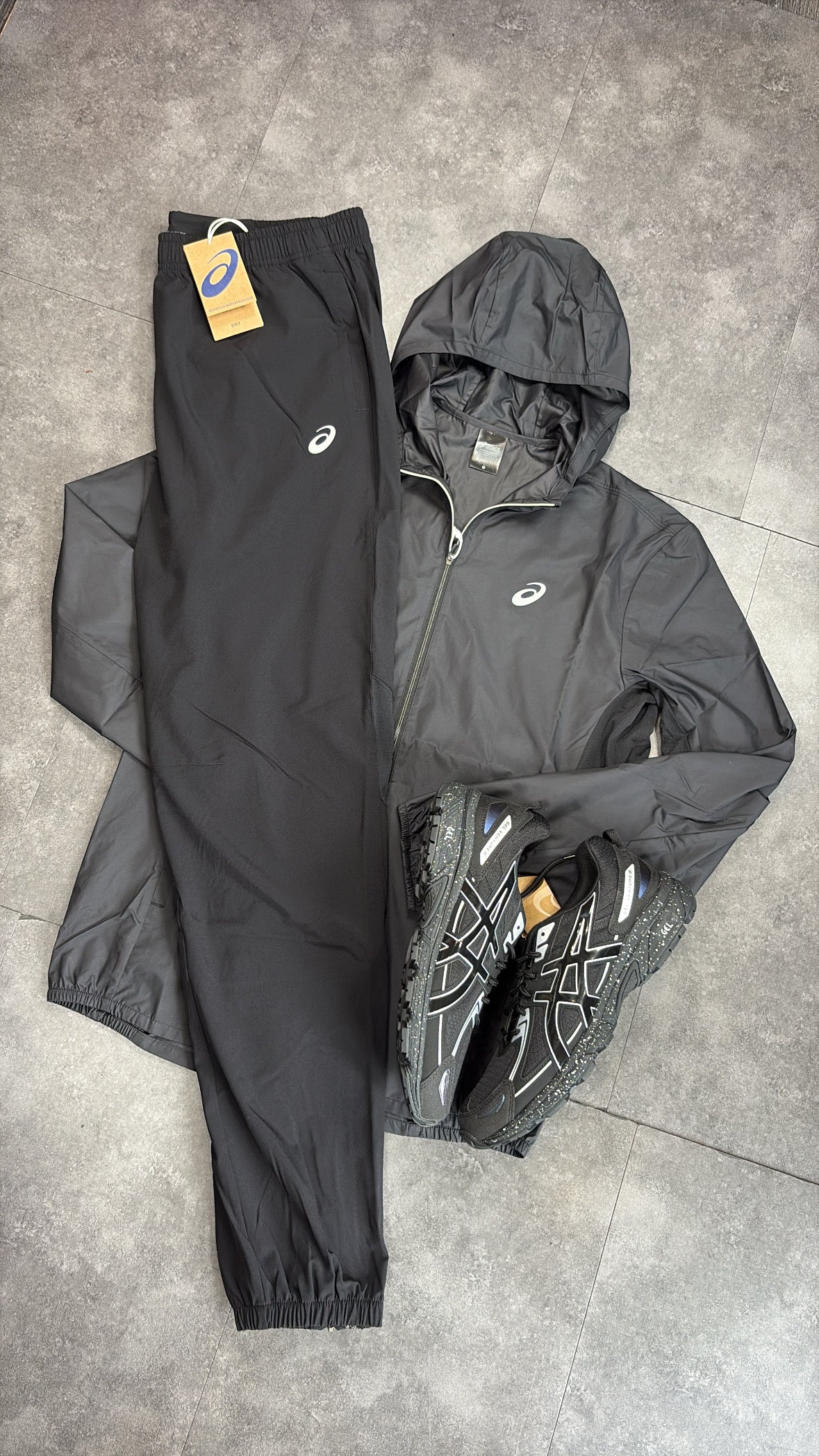 ASICS core tracksuit "black"