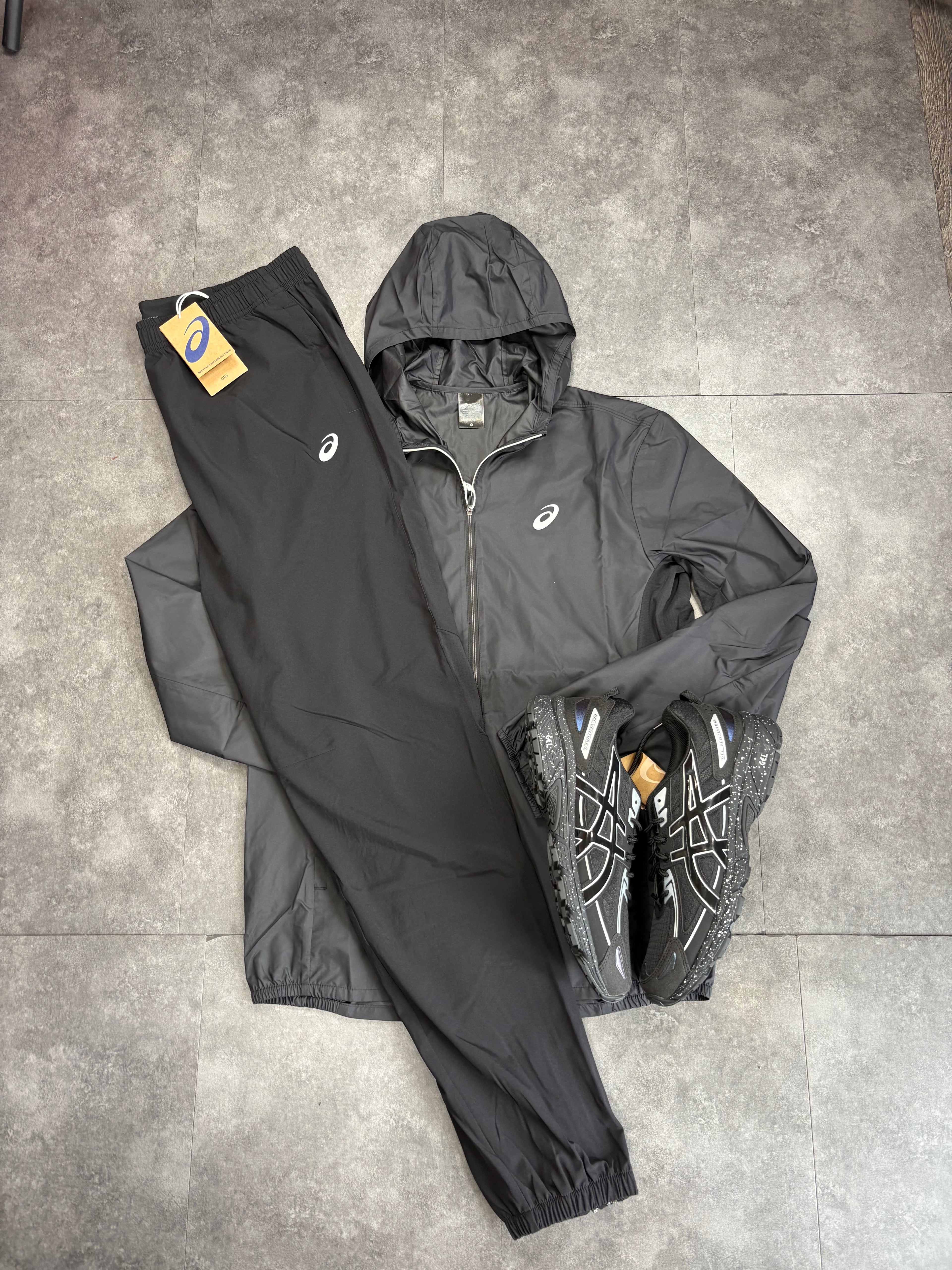 ASICS core tracksuit "black"